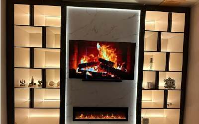 Modern alcove shelving and media unit built into a chimney breast.