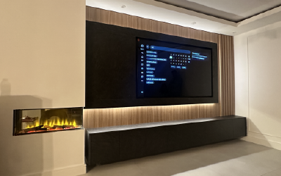Bespoke Space media wall with custom housing for a 75-inch flat-screen TV.