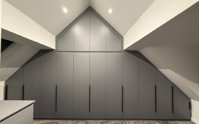 Bespoke loft wardrobes custom-built for sloped ceilings and angled walls.