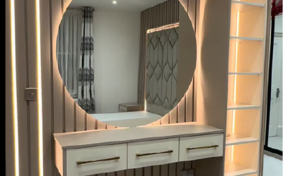 Bespoke wardrobe internals including pull-out jewelry trays and shoe racks.