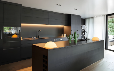Bespoke Space open-plan kitchen merging seamlessly into a modern living room.