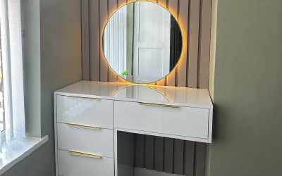 Bespoke wardrobe internals including pull-out jewelry trays and shoe racks.