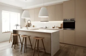 Luxury kitchen island featuring a waterfall quartz worktop and breakfast bar.