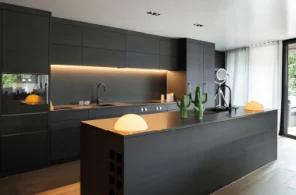 Bespoke Space open-plan kitchen merging seamlessly into a modern living room.