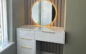 Bespoke wardrobe internals including pull-out jewelry trays and shoe racks.